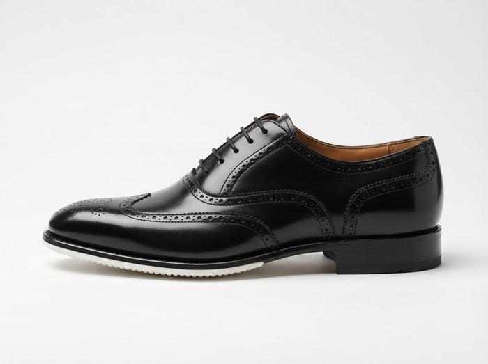 The Wolf Medallion Toe Lace Oxford — Polished Black w/ Broguing & EVA Sole